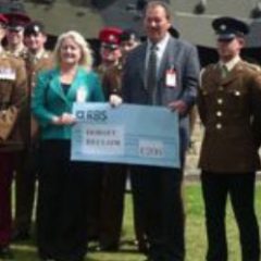 Dorset Reclaim receives a cheque from the Armoury Centre at Allenby Barracks